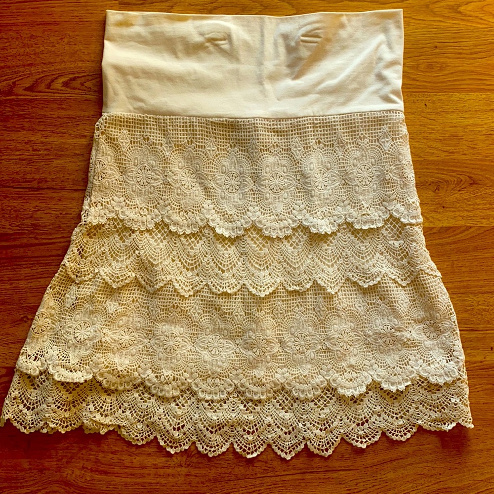 Cream colored solitaire Skirt. New with tags! Great condition.